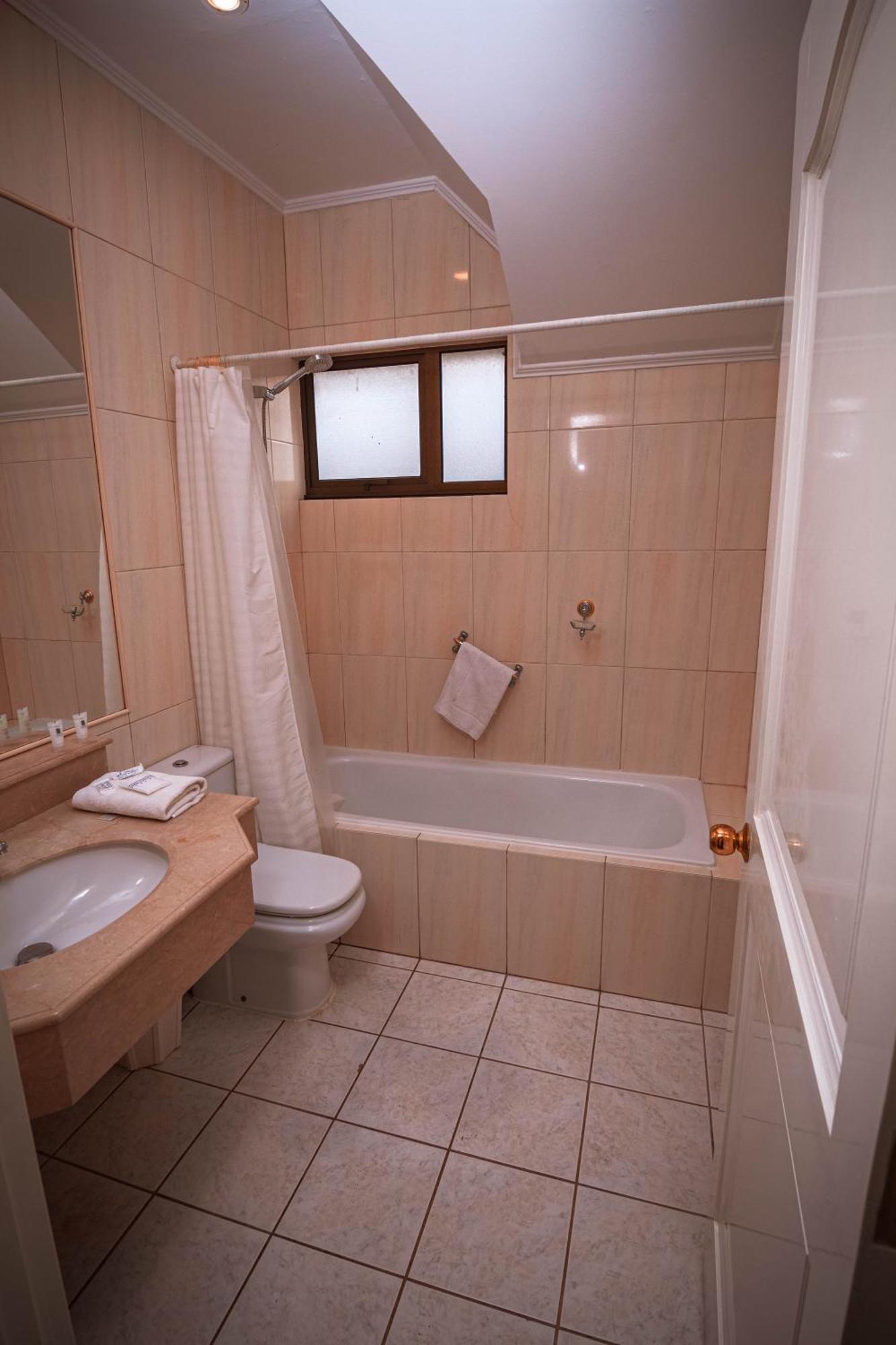 Hotel Inti Kuyen Plaza ปูกอน ภายนอก รูปภาพ
